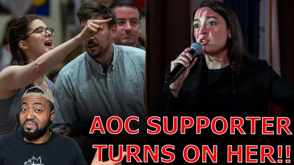 AOC HECKLED To Her Face ‘YOU ARE  A WAR CRIMINAL’ As Supporter TURNS ON HER At NYC Town Hall!